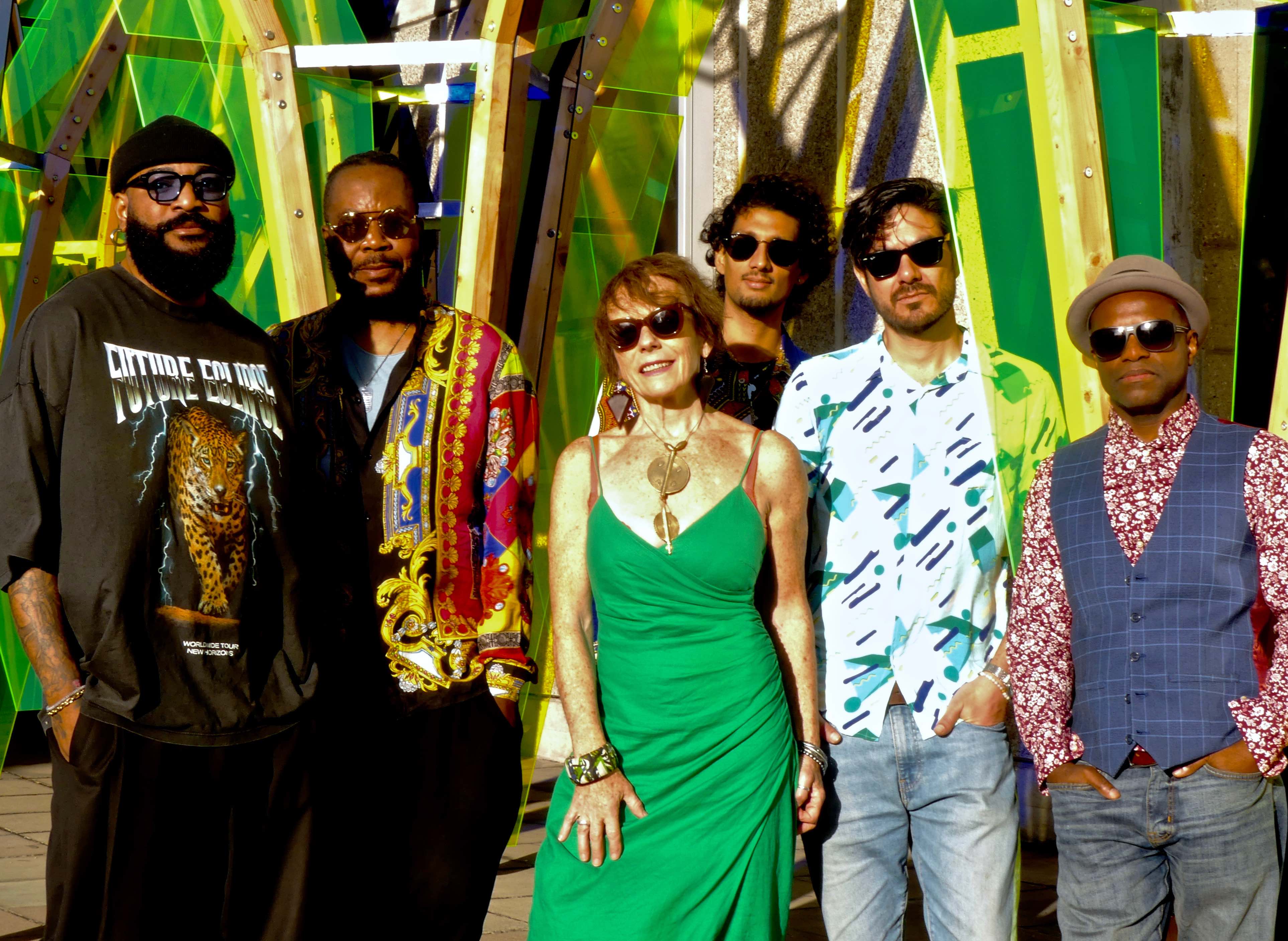 Grupo Lokito standing smaller